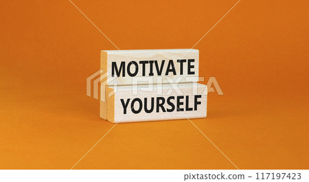 Motivate yourself symbol. Concept words Motivate yourself on beautiful wooden blocks. Beautiful orange table orange background. Business psychology motivate yourself concept. Copy space. Motivate yourself symbol. Concept words Motivate yourself on beautiful wooden blocks. Beautiful orange table orange background. Business psychology motivate yourself concept. Copy space. 117197423