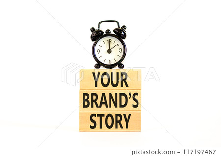 Branding and your brand story symbol. Concept words Your brands story on beautiful wooden blocks. Beautiful white background. Black alarm clock. Business branding your brand story concept. Copy space. 117197467