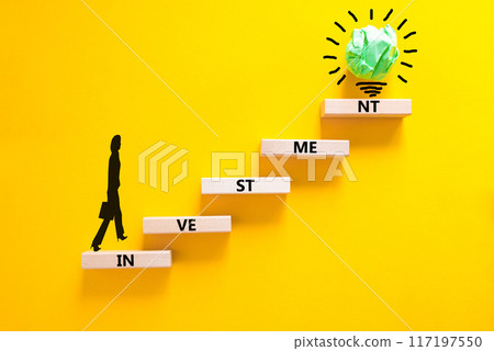 Investment symbol. Concept word Investment on beautiful wooden blocks. Businesswoman icon. Beautiful yellow background. Business investment concept. Copy space. Investment symbol. Concept word Investment on beautiful wooden blocks. Businesswoman icon. Beautiful yellow background. Business investment concept. Copy space. 117197550