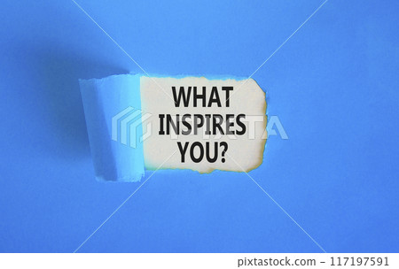 What inspires you symbol. Concept words What inspires you on beautiful white paper. Beautiful blue background. Business motivational what inspires you concept. Copy space. What inspires you symbol. Concept words What inspires you on beautiful white paper. Beautiful blue background. Business motivational what inspires you concept. Copy space. 117197591