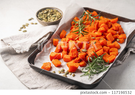 Oven baked pumpkin slices Oven baked pumpkin slices 117198532