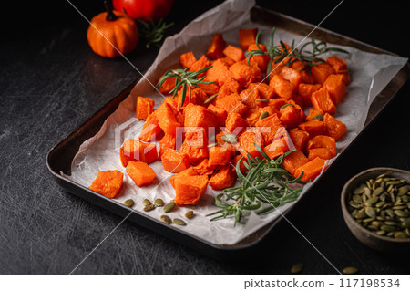 Oven baked pumpkin slices Oven baked pumpkin slices 117198534