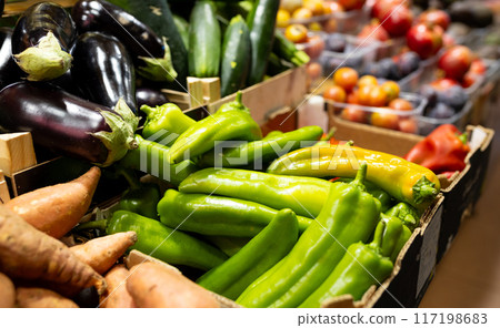 Fresh vegetable market sale counter on display. Organic vegetables ready to be sold in traditional markets Fresh vegetable market sale counter on display. Organic vegetables ready to be sold in traditional markets 117198683