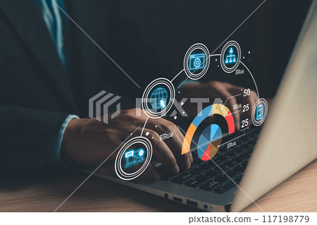 man use laptop with growth graphs and progress of business and analyze finance, and investment.Use technology to plan strategy to success goals and growth stock.online business, online marketing. 117198779