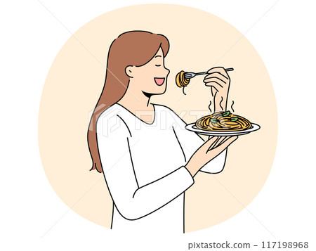 Woman stands with plate of spaghetti in hands and eats italian dish enjoying taste of pasta Woman stands with plate of spaghetti in hands and eats italian dish enjoying taste of pasta 117198968