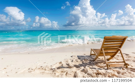 sandy ocean beach with a sun lounger sandy ocean beach with a sun lounger 117199504