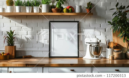 Blank white frame on a kitchen countertop with kitchenware and plants. Home interior design concept 117200313