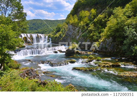 Waterfall Strbacki buk on river Una, Bosnia and Herzegovina. Nature background during summer 117200351