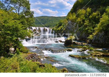 Waterfall Strbacki buk on river Una, Bosnia and Herzegovina. Nature background during summer Waterfall Strbacki buk on river Una, Bosnia and Herzegovina. Nature background during summer 117200352