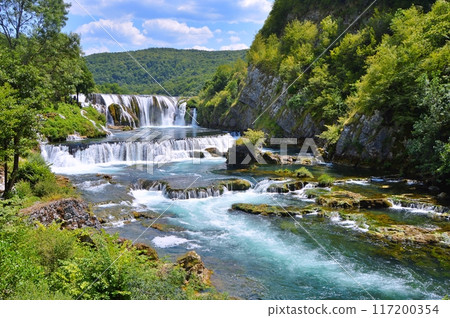 Waterfall Strbacki buk on river Una, Bosnia and Herzegovina. Nature background during summer Waterfall Strbacki buk on river Una, Bosnia and Herzegovina. Nature background during summer 117200354