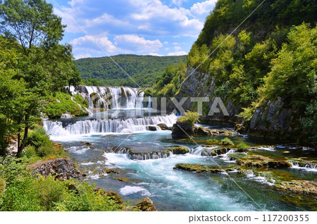 Waterfall Strbacki buk on river Una, Bosnia and Herzegovina. Nature background during summer Waterfall Strbacki buk on river Una, Bosnia and Herzegovina. Nature background during summer 117200355