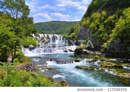 Waterfall Strbacki buk on river Una, Bosnia and Herzegovina. Nature background during summer Waterfall Strbacki buk on river Una, Bosnia and Herzegovina. Nature background during summer 117200356