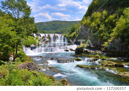 Waterfall Strbacki buk on river Una, Bosnia and Herzegovina. Nature background during summer Waterfall Strbacki buk on river Una, Bosnia and Herzegovina. Nature background during summer 117200357