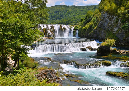 Waterfall Strbacki buk on river Una, Bosnia and Herzegovina. Nature background during summer 117200371