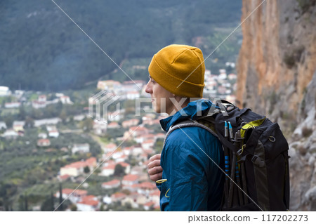 Man is travelling in the Mediterranean area. 117202273