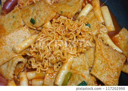 Korean food Tteokbokki, stir-fried rice cakes and fish cakes in a sweet and spicy sauce 117202998
