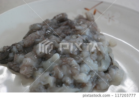 Chopped live octopus 117203777