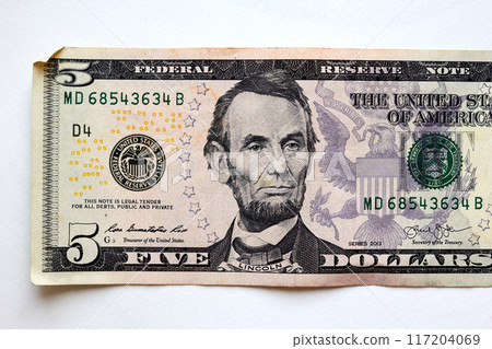 Close-up five US dollar bill, top view point Close-up five US dollar bill, top view point 117204069