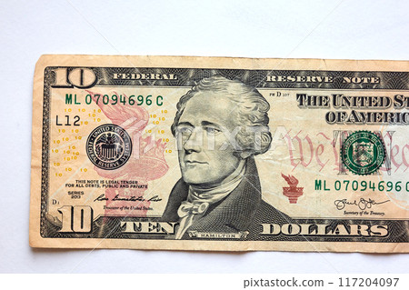 Close-up ten US dollar bill, top view point Close-up ten US dollar bill, top view point 117204097