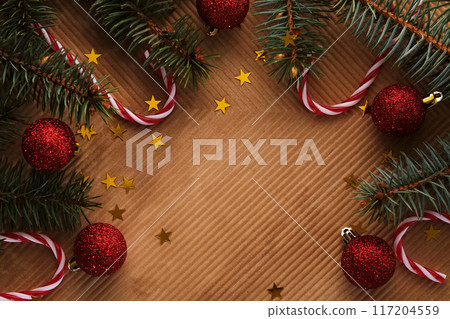 Abstract Christmas and New Year's background with Christmas tree and red Christmas balls. Abstract Christmas and New Year's background with Christmas tree and red Christmas balls. 117204559