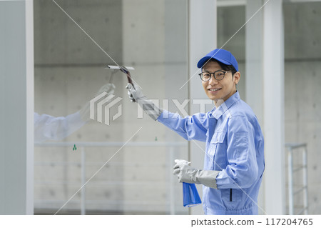 cleaning staff cleaning windows cleaning staff cleaning windows 117204765
