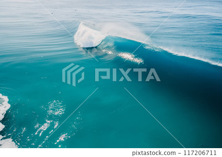 Barrel wave in tropical ocean. Breaking barrel wave. Aerial view 117206711