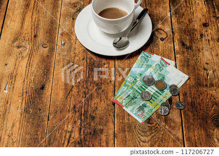 Image of paying at a restaurant Image of paying at a restaurant or cafe abroad Image of paying at a restaurant Image of paying at a restaurant or cafe abroad 117206727