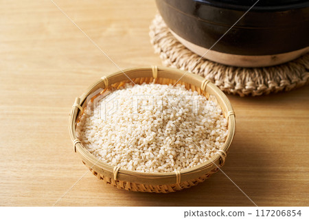 Germinated rice in a colander 117206854