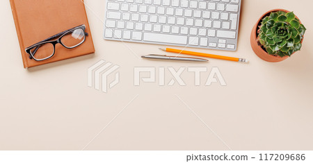 Office desk table with computer and supplies Office desk table with computer and supplies 117209686