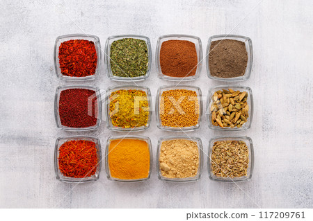 Various spices on the table 117209761