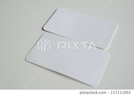 Blank business cards isolated on white background 117211002