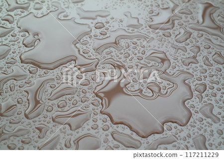 Water drops on a glass surface. Abstract background of water droplets. 117211229