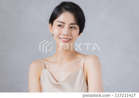 Beauty image of a woman with short hair Beauty image of a woman with short hair 117211427