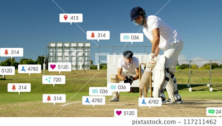 Image of social media icons with growing numbers over caucasian male cricket players 117211462