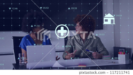 Image of financial data processing over diverse business people in office Image of financial data processing over diverse business people in office 117211741