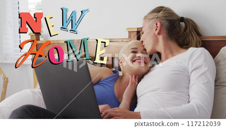 Image of new home text over diverse female couple using laptop 117212039