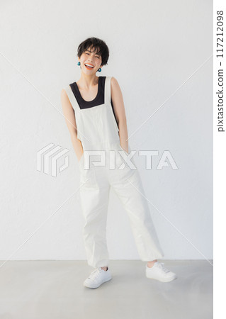 A woman with short hair doing DIY A woman with short hair doing DIY 117212098