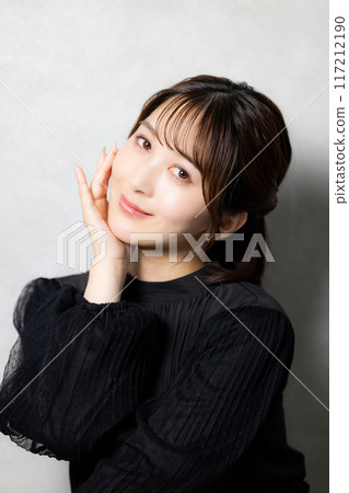 Female in black blouse 117212190