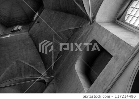 Ancient church interior, cracked gray stone walls and windows Ancient church interior, cracked gray stone walls and windows 117214490