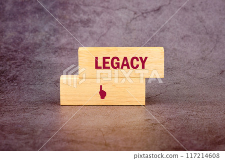Legacy written on wooden blocks on an abstract background Legacy written on wooden blocks on an abstract background 117214608