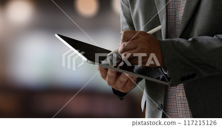 closeup man using his tablet touching screen device isolated screen ONLINE ADVERTISING 117215126