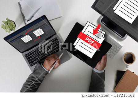 PDF button on screen Laptop computer converting process of document to another format Convert PDF files with online programs.. 117215162