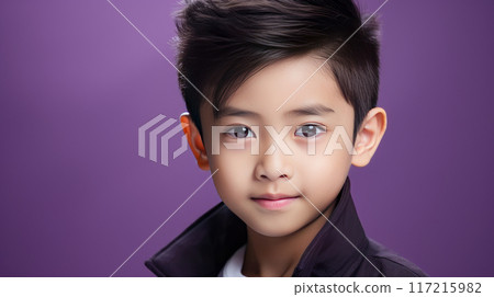 Portrait of a cute happy Asian boy child with perfect skin, purple background, banner. 117215982