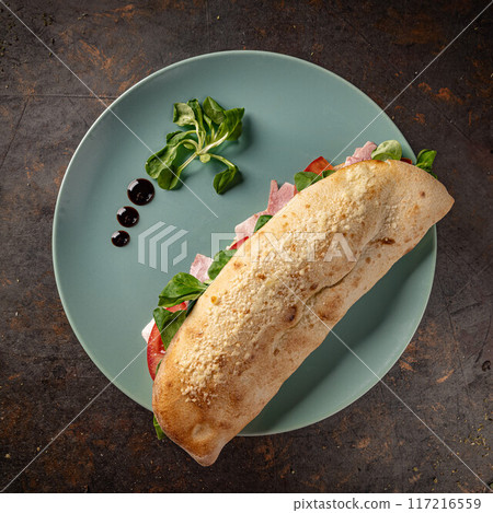 Delicious sandwich with tomatoes and ham 117216559