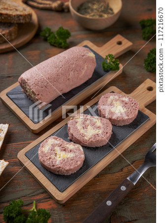 Ham roll with egg filling sliced Ham roll with egg filling sliced 117216670