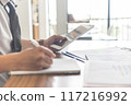 Side view of freelancer work from home 117216992