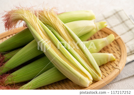 Corn tips, corn shoots, vegetables, baby corn husk 117217252