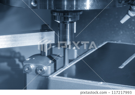 The CNC milling machine finish cut mold base by solid flat end mill tool in the light blue scene. The CNC milling machine finish cut mold base by solid flat end mill tool in the light blue scene. 117217993
