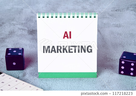 Business AI artificial intelligence marketing concept. Copy space. AI marketing symbol. Concept words AI MARKETING on a notebook on a gray background 117218223