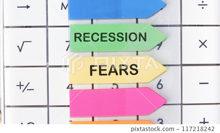 Business and recession fears concept. Copy space. Recession fears symbol. Concept words Recession on stickers on the background of the calculator Business and recession fears concept. Copy space. Recession fears symbol. Concept words Recession on stickers on the background of the calculator 117218242